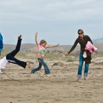Kids play skiprope on Morro Strand State Beach - Wholesome Family Scene