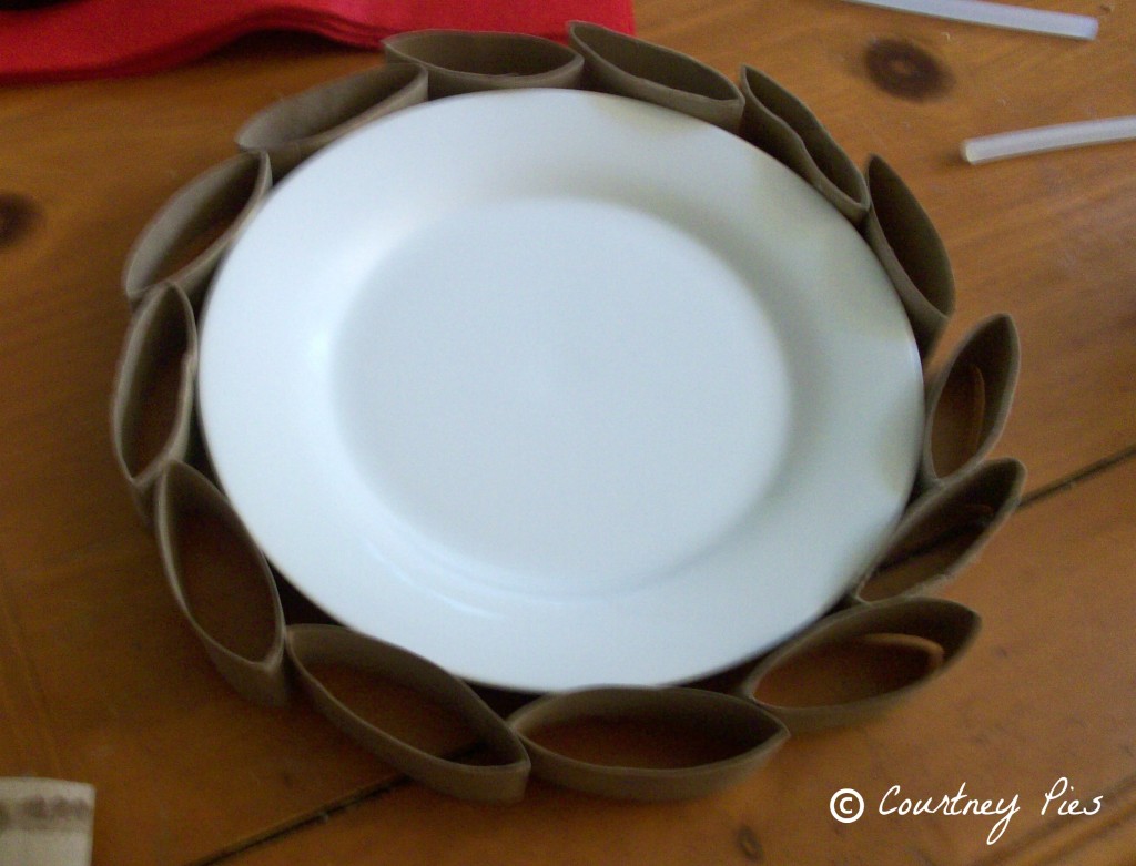 plate with toilet paper wreath around it 