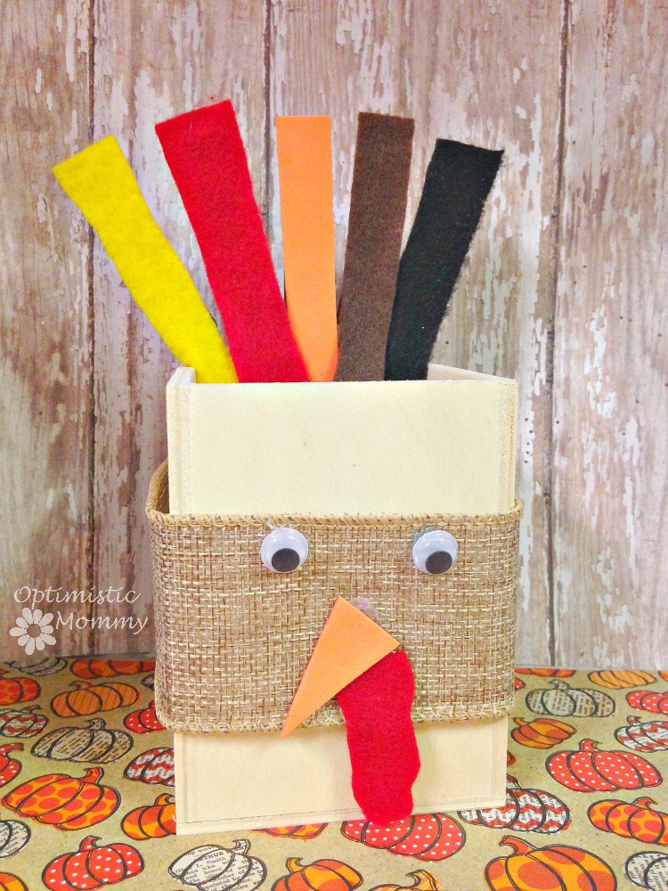 Make this super cute Thanksgiving Turkey Keepsake Box that is perfect for keeping recipes, photos and other keepsakes in it. It is easy to make! | Optimistic Mommy