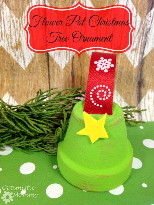 Flower Pot Christmas Tree Ornament: Do you love making your own holiday ornaments?  Then take a peek below at how you can turn an ordinary flower pot into a tiny tree perfect for hanging.  You only need a few supplies, and this is a craft perfect for children or adults to enjoy. | Optimistic Mommy