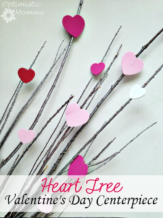 Heart Tree Valentine's Day Centerpiece: Wouldn’t it be lovely if Valentine’s grew on trees? This Valentine’s Day, grow your own tree of love when you craft this Heart Tree Valentine’s Day centerpiece. Made from less than $5 worth of supplies, you can craft a tree just as you see here. It is perfect for displaying in a vase on your Valentine’s Day table, or even for giving as a gift. | Optimistic Mommy