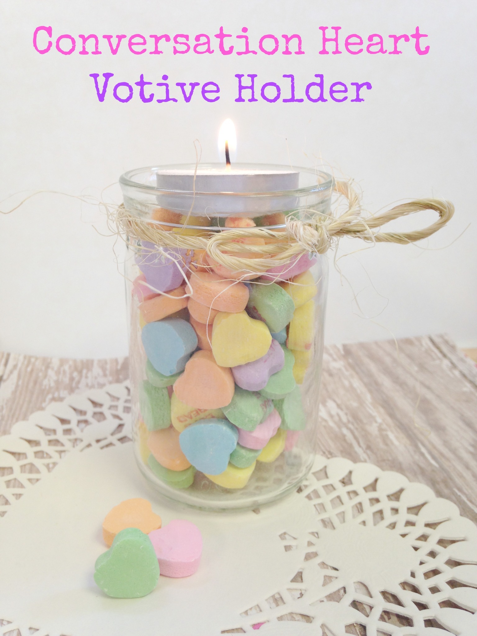 Do you love conversation hearts? They seem to reflect the Valentine’s Day season quite well! This season, why not work a few into your crafting? Here is how you can create a Valentine’s Day conversation hearts votive holder, perfect for displaying amongst your décor or for gift giving. | Optimistic Mommy