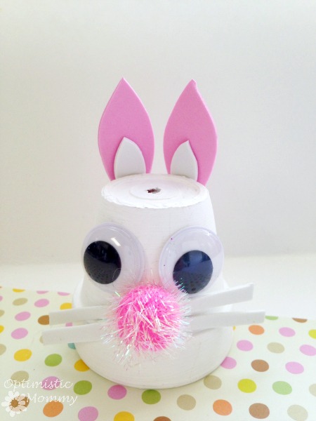 Easter Bunny Flower Pot: Turn an ordinary flower pot into something extraordinary when you craft this Easter bunny flower pot! | Optimistic Mommy