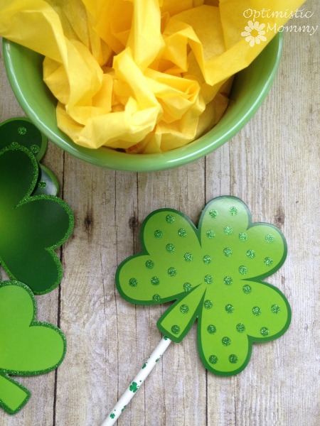 St. Patrick's Day Centerpiece: Finding St. Patrick’s Day décor can be a pricey endeavor, so why not try crafting your own instead? You can make a St. Patrick’s Day centerpiece just like the one you see here, using supplies you can find at your local Dollar Tree and craft store. | Optimistic Mommy