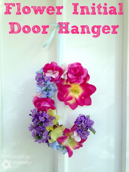 Flower Initial Door Hanger: Dress up your little girl's room when you give this flower initial door hanger a try. It is the perfect way to add a pop of color as well as personalization to any child's room or play space. | Optimistic Mommy