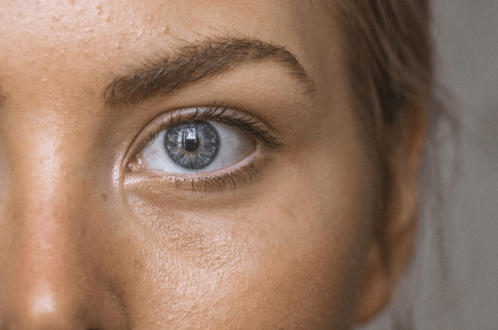 woman's eye and skin
