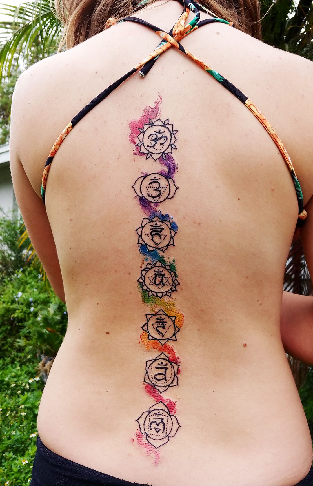 Bright Colorful Chakra Inspired Spine Tattoo