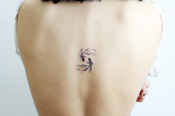 Small Koi Fish Spine Tattoo