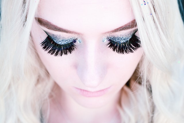 A girl with long-looking eyelashes.