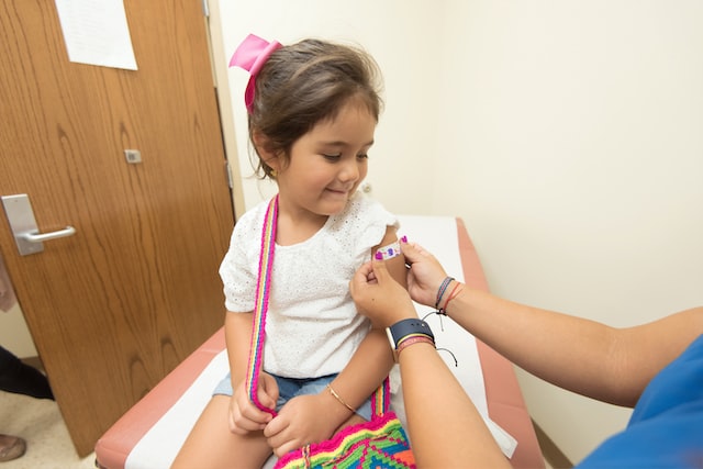 A girl getting examined in a care service.