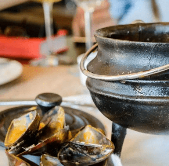Seafood cooked in a pot.