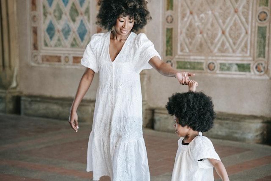 Mom and child wearing the same outfit.