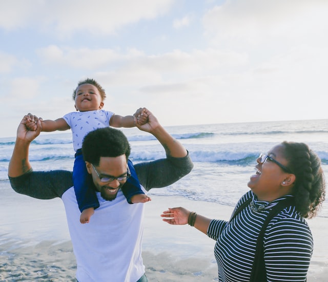 A family enjoying near the sea.