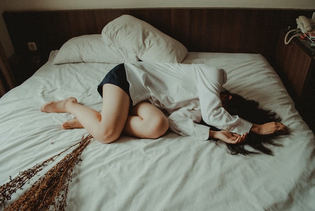 Morning Sickness,a woman sleeping on the bed.